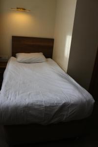 Кровать или кровати в номере Center Room Otel