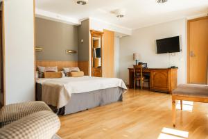 Postel nebo postele na pokoji v ubytování Sundvolden Hotel