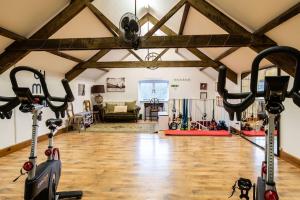 a gym with two exercise bikes in a room at The Garret in Salisbury