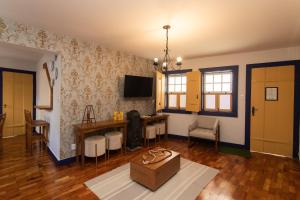 Et tv og/eller underholdning på Casa do Beco - Casa Inteira no Centro de Ouro Preto