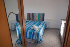 Posteľ alebo postele v izbe v ubytovaní Villa Al Mare Guest House
