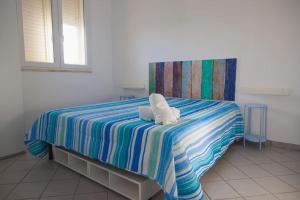 Posteľ alebo postele v izbe v ubytovaní Villa Al Mare Guest House