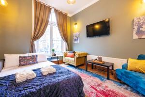 Televisyen dan/atau pusat hiburan di 2 Bedroom in Center of London