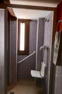 a bathroom with a sink and a window and a toilet at Casas Rurales Cortijo El Marqués in Quesada +32 photos