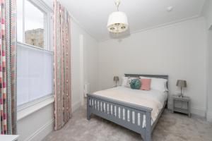 Postel nebo postele na pokoji v ubytování Peckitt Street Apartments + 44 fotografií