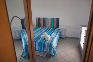 Posteľ alebo postele v izbe v ubytovaní Villa Al Mare Guest House