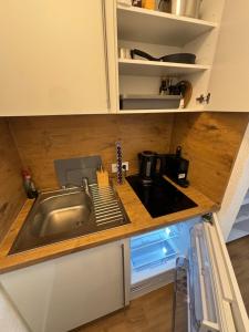 Kuchyň nebo kuchyňský kout v ubytování Zentrales Appartement im Herzen von Kempten