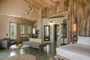 Postel nebo postele na pokoji v ubytování Villa Eugenia Sunrise