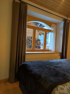 Postel nebo postele na pokoji v ubytování Appartement in St. Niklaus