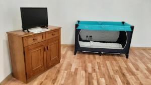 Postel nebo postele na pokoji v ubytování Apartmány Pražská