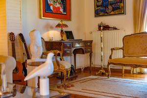 Posedenie v ubytovaní Art Gallery Villa Kefalonia Sea View and Breakfast