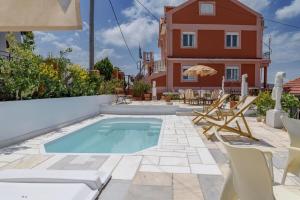 Bazén v ubytovaní Art Gallery Villa Kefalonia Sea View and Breakfast alebo v jeho blízkosti