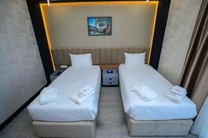 Postel nebo postele na pokoji v ubytování Arium Hotel Baku