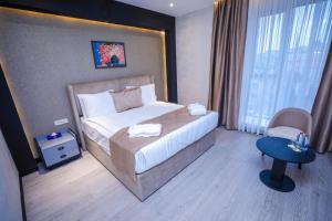 Postel nebo postele na pokoji v ubytování Arium Hotel Baku