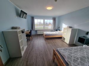 Ένα ή περισσότερα κρεβάτια σε δωμάτιο στο Dat Diekhus