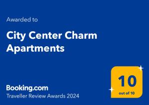 a yellow sign with the words city center channel apartments at City Center Charm Apartments in Plovdiv