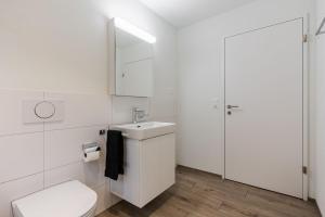 Koupelna v ubytování Melchtal Resort Apart Hotel