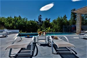 Fotografie z fotogalerie ubytování Xenos Villa 1 v destinaci Tigaki + 31 fotografií