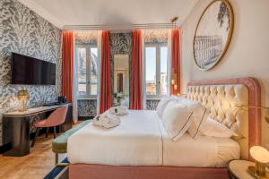 Postel nebo postele na pokoji v ubytování H10 Palazzo Galla + 37 fotografií