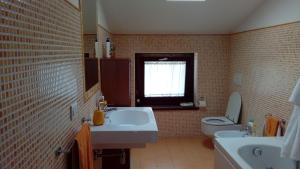 Phòng tắm tại Casa vacanze Migioia