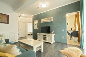 Μια τηλεόραση ή/και κέντρο ψυχαγωγίας στο Olivia Home