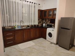 A kitchen or kitchenette at New Sithi Villas