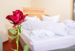 Postel nebo postele na pokoji v ubytování Hotel Sonnentau