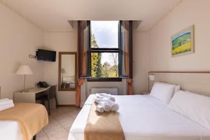 Postel nebo postele na pokoji v ubytování Villa La Stella