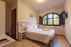 Postel nebo postele na pokoji v ubytování Villa La Stella