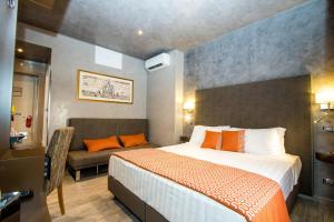 Postel nebo postele na pokoji v ubytování Vaticano Julia Guest House