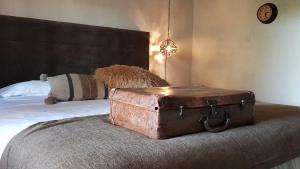 Postel nebo postele na pokoji v ubytování Le Lodge des Flâneurs