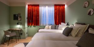 Letto o letti in una camera di Urban Hive Milano