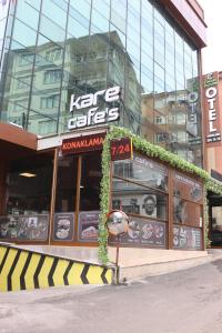 a korean fast food restaurant in front of a building at Center Room Otel in Yenimahalle