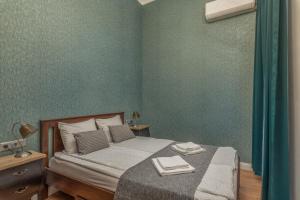 Apartment with private terrace - Near Gellert Thermal Bath tesisinde bir odada yatak veya yataklar