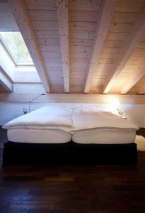Postel nebo postele na pokoji v ubytování Chalet Altesse - Premium Apartments