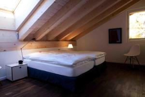 Postel nebo postele na pokoji v ubytování Chalet Altesse - Premium Apartments