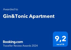 Certifikat, nagrada, logo ili neki drugi dokument izložen u objektu Gin&Tonic Apartment