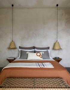 Postel nebo postele na pokoji v ubytování Villa Gaia - Secret Roc Villas