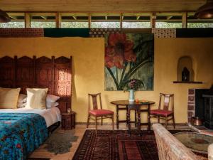 Katil atau katil-katil dalam bilik di Black Pig Retreats Luxury Glamping