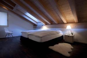 Postel nebo postele na pokoji v ubytování Chalet Altesse - Premium Apartments