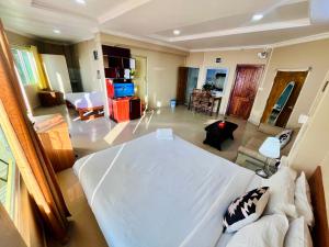 Voodi või voodid majutusasutuse Aizawl Guest House Apartments toas