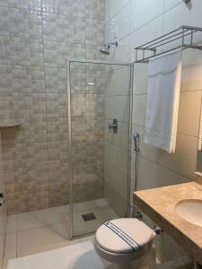 Um banheiro em Hotel Jardim