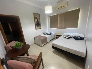 Cama ou camas em um quarto em Hotel Jardim
