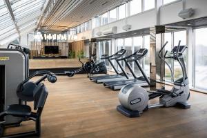 a gym with treadmills and elliptical machines at Quality Hotel Edvard Grieg in Bergen