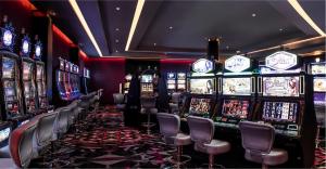 a casino with a bunch of slot machines at Studio en Las Cañitas in Buenos Aires