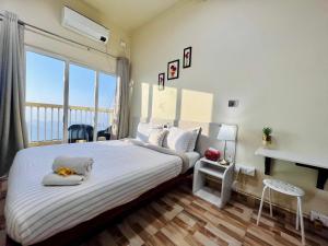 Voodi või voodid majutusasutuse Aizawl Guest House Apartments toas