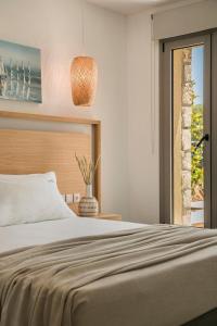 Posteľ alebo postele v izbe v ubytovaní Villa Erofili - Ionian Treasure Villas