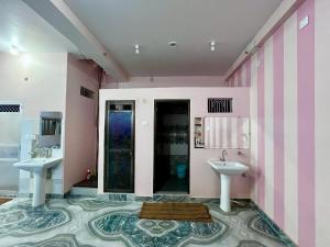 Koupelna v ubytování Trilok Residency - Dashashwamedh Varanasi