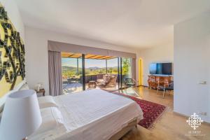 TV a/nebo společenská místnost v ubytování Villa Dama - Luxury Escape