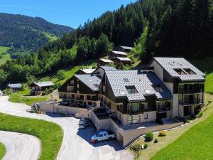 an aerial view of a large house in the mountains at Appartement Arêches-Beaufort, 3 pièces, 6 personnes - FR-1-342-152 in Arêches-Beaufort